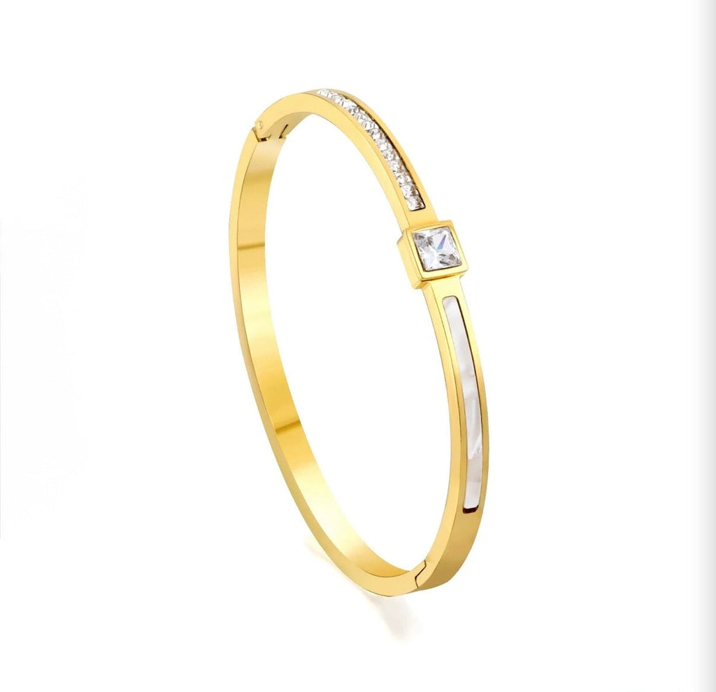 Aurelia Mother-of-Pearl Bangle – gold version on white background