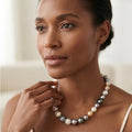 Iris Iridescent Pearl Necklace – model wearing multi-color strand at collarbone